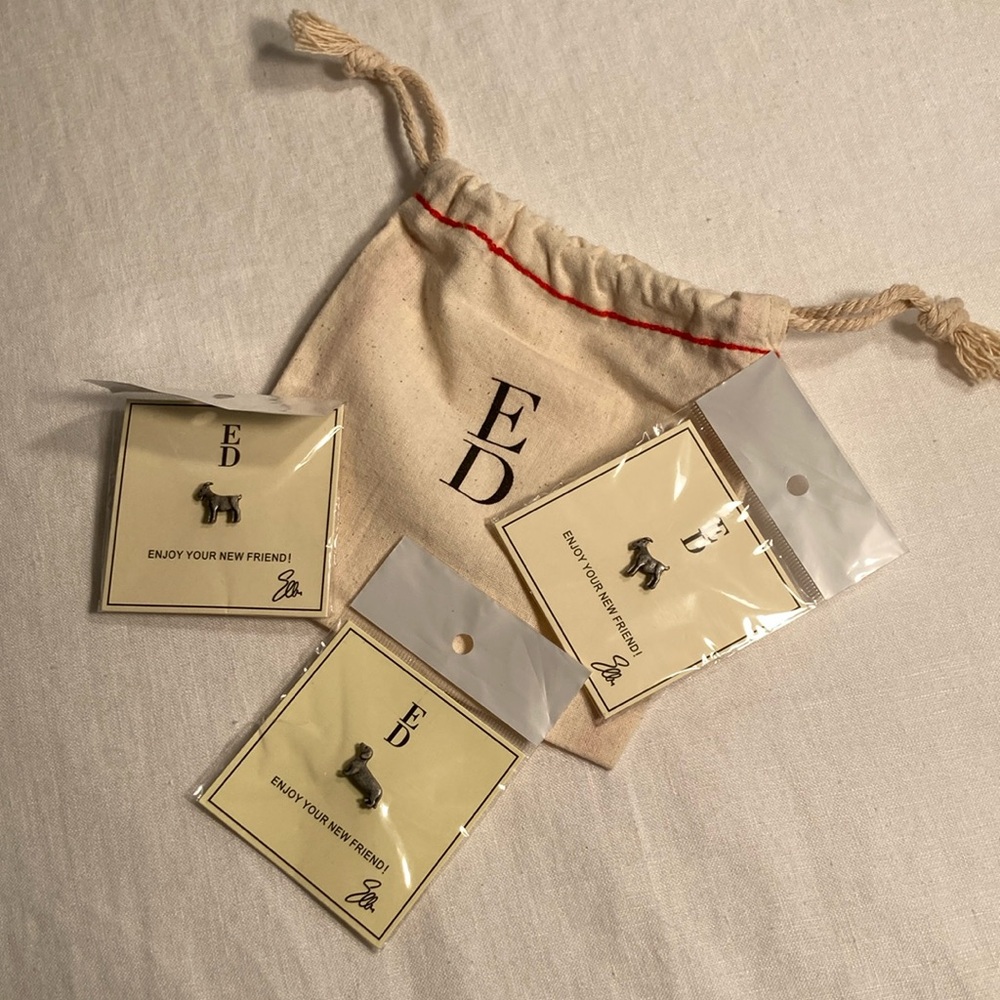 Ellen DeGeneres two goat pins one dachshund pin in bag